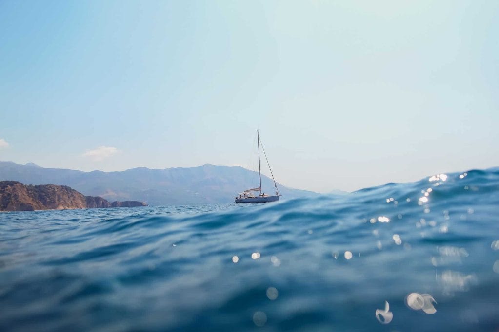 yacht sail in sea with picturesque view